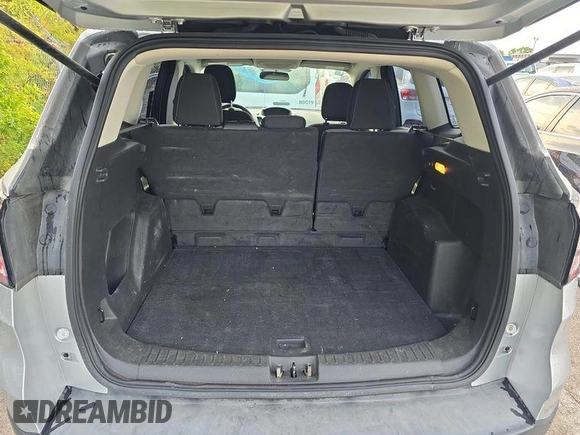 2018 Ford Escape S with VIN 1FMCU0F72JUB68024, listed as a IAAI auction lot 42849105 with 96,473 mi miles and . Bid and sale history available at DreamBid. Image 8.