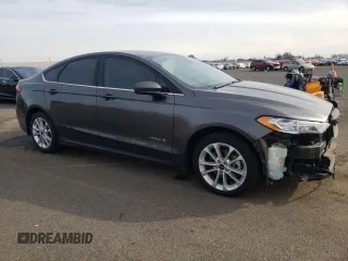 2019 Ford Fusion Hybrid SE with VIN 3FA6P0LU0KR134715, listed as a Copart auction lot 40792953 with 93,191 mi miles. Bid and sale history available at carsss.com. Image 4.