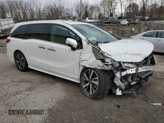 2020 Honda Odyssey Elite with VIN 5FNRL6H95LB035854, listed as a Copart auction lot 53243425 with 40,598 mi miles and Salvage Title. Bid and sale history available at DreamBid. Image 4.