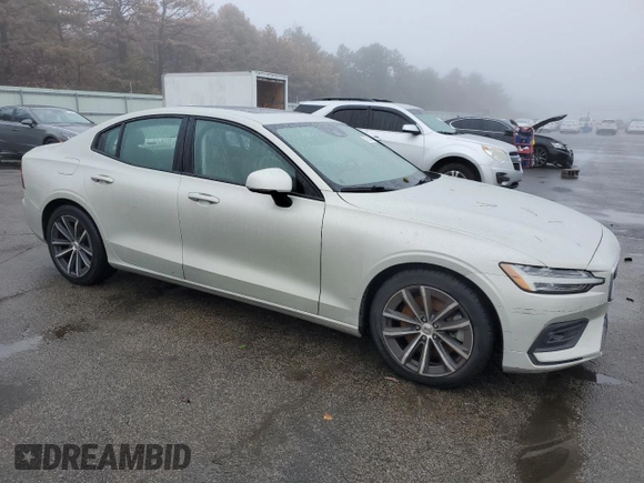 2021 Volvo S60 Momentum with VIN 7JRA22TK9MG093235, listed as a Copart auction lot 77105143 with 27,141 mi miles. Bid and sale history available at carsss.com. Image 4.