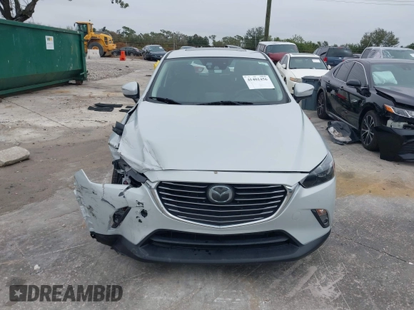 2016 Mazda CX-3 Grand Touring with VIN JM1DKDD72G0128891, listed as a IAAI auction lot 41401456 with 60,911 mi miles. Bid and sale history available at carsss.com. Image 12.