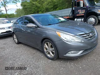 2012 Hyundai Sonata SE z VIN 5NPEC4AC5CH415951, wystawiony jako IAAI lot #42416363 z przebiegiem 205 744 mil mil oraz . Historia ofert i sprzedaży dostępna na DreamBid. Obrazek 1.