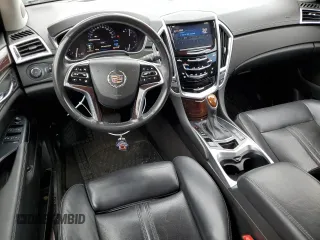 2015 Cadillac SRX Premium Collection with VIN 3GYFNGE32FS528514, listed as a Copart auction lot 61222534 with 104,433 mi miles and Salvage Title. Bid and sale history available at carsss.com. Image 8.