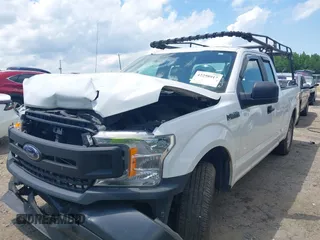 2018 Ford F-150 XL with VIN 1FTEX1CB5JFE55932, listed as a IAAI auction lot 42298917 with 143,923 mi miles and . Bid and sale history available at DreamBid. Image 22.