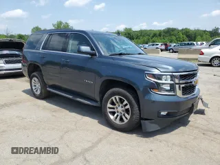 2020 Chevrolet Tahoe LT with VIN 1GNSKBKC0LR260766, listed as a Copart auction lot 61465725 with 104,850 mi miles and Salvage title. Bid and sale history available at DreamBid. Image 4.