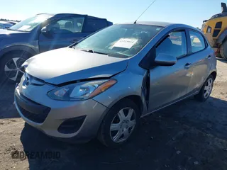 2011 Mazda 2 Sport with VIN JM1DE1HY9B0121499, listed as a IAAI auction lot 41335064 with 128,277 mi miles. Bid and sale history available at carsss.com. Image 2.