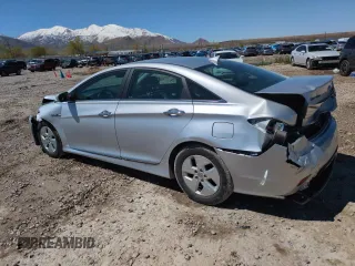 2012 Hyundai Sonata Hybrid с VIN KMHEC4A40CA063129, выставлен на аукционе Copart как лот 52650245 с пробегом 121 519 миль миль и Списание • Salvage title. История ставок и продаж доступна на DreamBid. Изображение 2.
