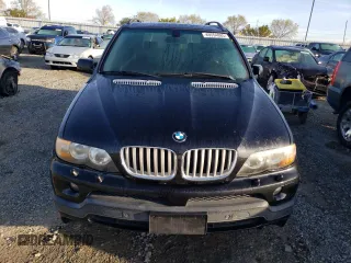 2005 BMW X5 4.8is with VIN 5UXFA935X5LE83006, listed as a Copart auction lot 49554885 with 160,136 mi miles and Clean Title. Bid and sale history available at carsss.com. Image 5.