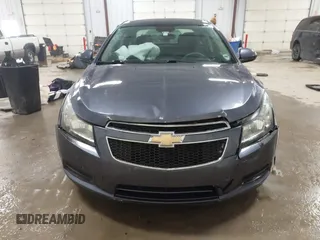 2014 Chevrolet Cruze 1LT z VIN 1G1PC5SB4E7175022, wystawiony jako IAAI lot #41563090 z przebiegiem 109 754 mil mil oraz . Historia ofert i sprzedaży dostępna na DreamBid. Obrazek 12.