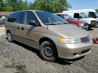 2000 Honda Odyssey LX z VIN 2HKRL1856YH626249, wystawiony jako Copart lot #57246805 z przebiegiem 179 546 mil mil oraz Szkoda całkowita • Salvage title. Historia ofert i sprzedaży dostępna na DreamBid. Obrazek 4.
