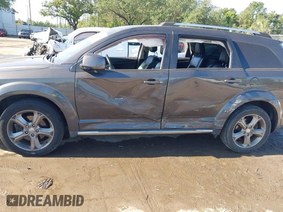2016 Dodge Journey Crossroad Plus z VIN 3C4PDCGB0GT209506, wystawiony jako IAAI lot #42044055 z przebiegiem 93 115 mil mil oraz . Historia ofert i sprzedaży dostępna na DreamBid. Obrazek 6.