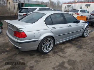 2001 BMW 3 Series 330i with VIN WBAAV53421JS90915, listed as a IAAI auction lot 41633836 with 215,109 mi miles. Bid and sale history available at carsss.com. Image 4.