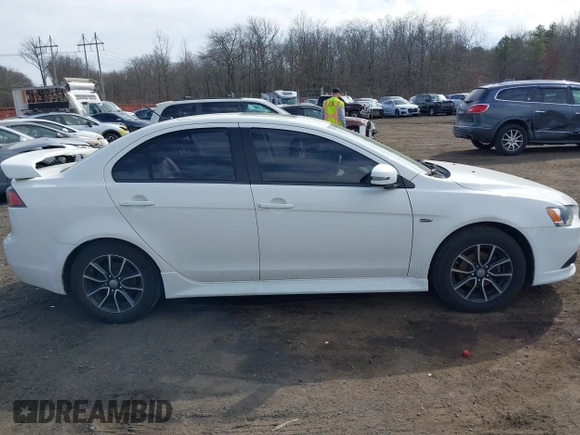 2015 Mitsubishi Lancer SE with VIN JA32V2FW9FU025402, listed as a IAAI auction lot 41646407 with 67,201 mi miles. Bid and sale history available at carsss.com. Image 13.