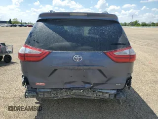 2015 Toyota Sienna XLE with VIN 5TDYK3DC4FS619385, listed as a Copart auction lot 57090385 with 112,896 mi miles and Salvage title. Bid and sale history available at DreamBid. Image 6.