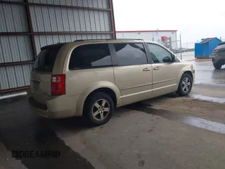 2010 Dodge Grand Caravan SXT with VIN 2D4RN5D17AR496854, listed as a IAAI auction lot 42210738 with 213,121 mi miles and . Bid and sale history available at DreamBid. Image 4.