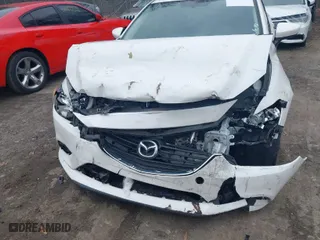 2015 Mazda Mazda6 i Touring with VIN JM1GJ1V66F1173314, listed as a IAAI auction lot 41101860 with 160,338 mi miles. Bid and sale history available at carsss.com. Image 6.