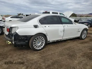 2013 BMW 7 Series 740i with VIN WBAYA6C58DC995137, listed as a Copart auction lot 75774104 with 61,847 mi miles and Salvage Title. Bid and sale history available at carsss.com. Image 3.