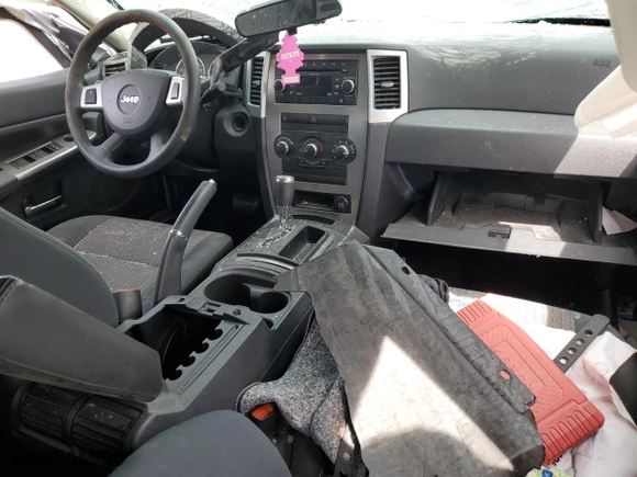 2010 Jeep Grand Cherokee Laredo with VIN 1J4PS4GK8AC156451, listed as a Copart auction lot 49108554 with 0 mi miles and Salvage Title. Bid and sale history available at carsss.com. Image 8.
