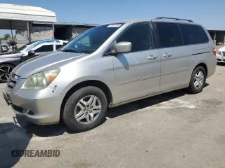 2007 Honda Odyssey EX with VIN 5FNRL38447B422016, listed as a Copart auction lot 62879185 with 144,336 mi miles and Salvage title. Bid and sale history available at DreamBid. Image 1.