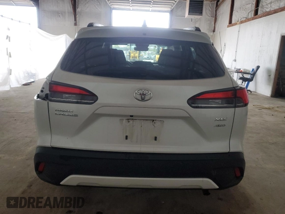 2023 Toyota Corolla Cross XLE with VIN 7MUDAABG7PV068968, listed as a Copart auction lot 51922695 with 43,911 mi miles and Salvage title. Bid and sale history available at DreamBid. Image 6.