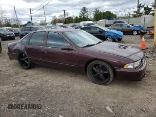 1995 Chevrolet Caprice with VIN 1G1BL52P0SR152620, listed as a Copart auction lot 53154365 with 223,365 mi miles and Salvage Title. Bid and sale history available at DreamBid. Image 4.