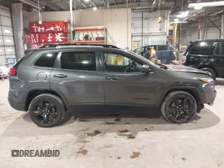 2016 Jeep Cherokee Latitude with VIN 1C4PJLCSXGW137190, listed as a IAAI auction lot 41563823 with 159,586 mi miles. Bid and sale history available at carsss.com. Image 14.