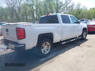 2016 Chevrolet Silverado 1500 LT with VIN 1GCUKREC1GF121209, listed as a IAAI auction lot 42024911 with 152,671 mi miles and . Bid and sale history available at DreamBid. Image 4.
