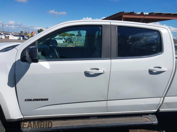 2018 Chevrolet Colorado 4WD Work Truck z VIN 1GCGTBEN0J1216173, wystawiony jako IAAI lot #41788805 z przebiegiem 216 820 mil mil oraz . Historia ofert i sprzedaży dostępna na DreamBid. Obrazek 15.