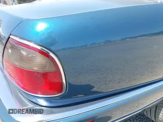 1996 Jaguar XJ with VIN SAJHX1740TC766425, listed as a IAAI auction lot 42758458 with 257,849 mi miles and . Bid and sale history available at DreamBid. Image 6.