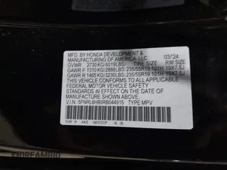 2024 Honda Odyssey Touring z VIN 5FNRL6H80RB044915, wystawiony jako IAAI lot #41921539 z przebiegiem 13 425 mil mil oraz . Historia ofert i sprzedaży dostępna na DreamBid. Obrazek 9.
