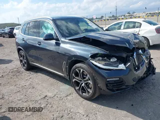 2021 BMW X5 sDrive40i with VIN 5UXCR4C01M9G07906, listed as a IAAI auction lot 41847036 with 16,307 mi miles. Bid and sale history available at carsss.com. Image 1.