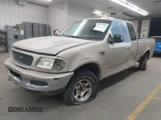 1998 Ford F-150 with VIN 1FTZX18W6WKA83626, listed as a IAAI auction lot 40625179 with 343,403 mi miles and . Bid and sale history available at DreamBid. Image 2.