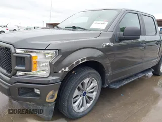 2018 Ford F-150 XL z VIN 1FTEW1CP3JKC21438, wystawiony jako IAAI lot #42207035 z przebiegiem 86 417 mil mil oraz . Historia ofert i sprzedaży dostępna na DreamBid. Obrazek 6.