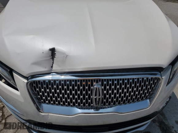 2019 Lincoln MKC Select with VIN 5LMCJ2C9XKUL01878, listed as a Copart auction lot 60434995 with 88,168 mi miles and Salvage title. Bid and sale history available at DreamBid. Image 12.