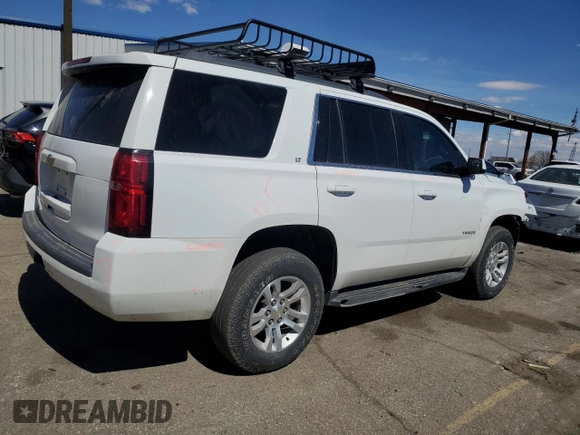 2019 Chevrolet Tahoe LT with VIN 1GNSKBKC5KR137818, listed as a Copart auction lot 50654885 with 138,334 mi miles and Salvage title. Bid and sale history available at DreamBid. Image 3.