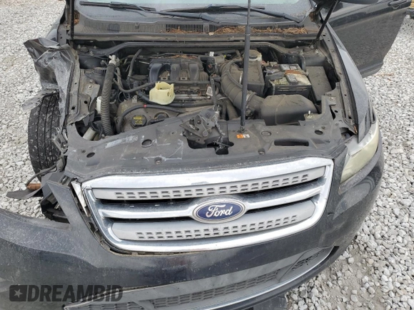 2011 Ford Taurus Limited z VIN 1FAHP2FW3BG107341, wystawiony jako Copart lot #53926025 z przebiegiem 198 369 mil mil oraz Szkoda całkowita • Salvage title. Historia ofert i sprzedaży dostępna na DreamBid. Obrazek 11.