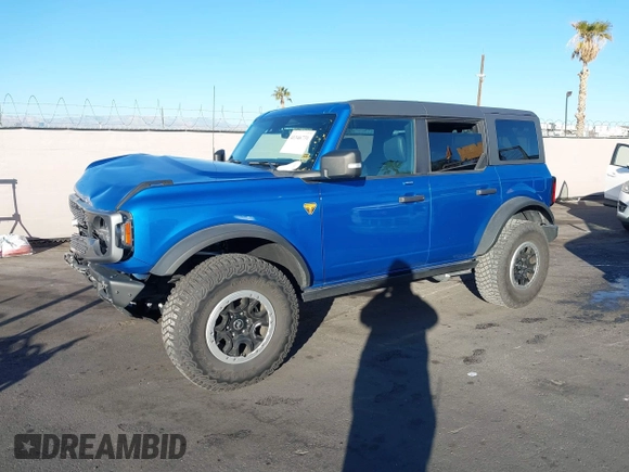 2022 Ford Bronco z VIN 1FMEE5DPXNLB37346, wystawiony jako IAAI lot #41346731 z przebiegiem 20 709 mil mil oraz . Historia ofert i sprzedaży dostępna na DreamBid. Obrazek 2.