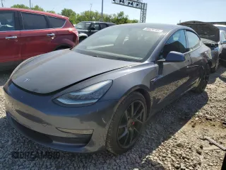 2020 Tesla Model 3 Performance z VIN 5YJ3E1EC3LF646940, wystawiony jako Copart lot #56626765 z przebiegiem 79 536 mil mil oraz Szkoda całkowita • Salvage title. Historia ofert i sprzedaży dostępna na DreamBid. Obrazek 1.