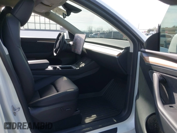 2024 Tesla Model Y Long Range with VIN 7SAYGDEE8RF161370, listed as a IAAI auction lot 41692706 with 11,490 mi miles. Bid and sale history available at carsss.com. Image 5.