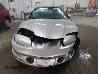 2002 Pontiac Firebird Formula z VIN 2G2FV22G222107252, wystawiony jako Copart lot #68626414 z przebiegiem 195 430 mil mil oraz Szkody całkowita. Historia ofert i sprzedaży dostępna na DreamBid. Obrazek 5.