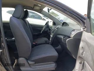 2008 Toyota Yaris with VIN JTDBT923984013457, listed as a IAAI auction lot 42104365 with 242,157 mi miles. Bid and sale history available at carsss.com. Image 5.