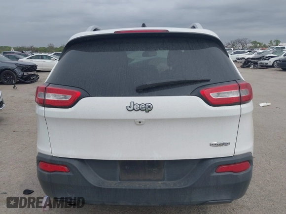 2018 Jeep Cherokee Latitude with VIN 1C4PJLCBXJD558927, listed as a IAAI auction lot 41942214 with 84,289 mi miles. Bid and sale history available at carsss.com. Image 16.