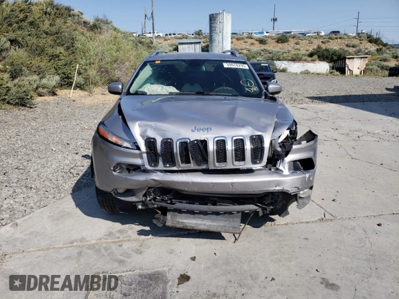 2018 Jeep Cherokee Latitude with VIN 1C4PJMCBXJD564118, listed as a Copart auction lot 59978295 with 115,815 mi miles and Salvage title. Bid and sale history available at DreamBid. Image 5.