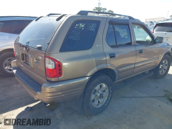 2001 Isuzu Rodeo S with VIN 4S2CK58W414322118, listed as a IAAI auction lot 41496624 with 244,189 mi miles and . Bid and sale history available at DreamBid. Image 4.