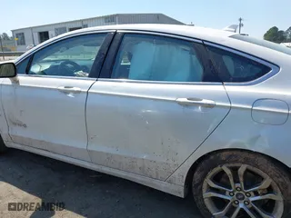 2019 Ford Fusion Hybrid Titanium with VIN 3FA6P0RU9KR126815, listed as a IAAI auction lot 41908472 with 146,059 mi miles. Bid and sale history available at carsss.com. Image 13.
