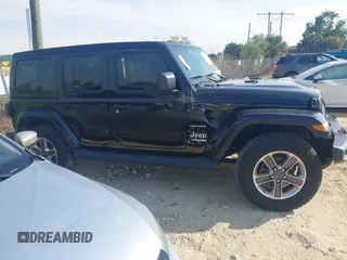 2021 Jeep Wrangler Unlimited Sahara with VIN 1C4HJXEG3MW536507, listed as a IAAI auction lot 41601893 with 51,214 mi miles and . Bid and sale history available at DreamBid. Image 13.