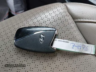 2014 Hyundai Santa Fe with VIN 5XYZU3LB9EG229255, listed as a IAAI auction lot 42407410 with 201,523 mi miles and . Bid and sale history available at DreamBid. Image 11.