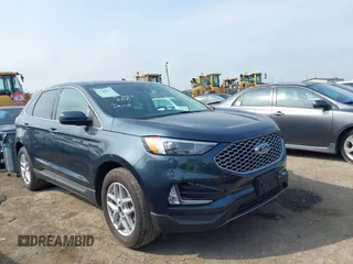 2024 Ford Edge SEL z VIN 2FMPK4J94RBB10960, wystawiony jako IAAI lot #42075306 z przebiegiem 6 832 mil mil oraz . Historia ofert i sprzedaży dostępna na DreamBid. Obrazek 1.