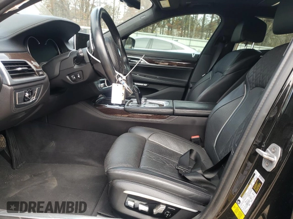 2016 BMW 7 Series 750i with VIN WBA7F0C5XGGL99017, listed as a Copart auction lot 84934504 with 0 mi miles and Salvage Title. Bid and sale history available at carsss.com. Image 7.