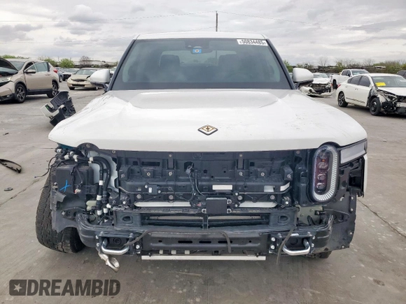 2022 Rivian R1T Adventure z VIN 7FCTGAAA8NN013508, wystawiony jako Copart lot #50834485 z przebiegiem Nie podano mil oraz Szkody całkowita. Historia ofert i sprzedaży dostępna na DreamBid. Obrazek 5.